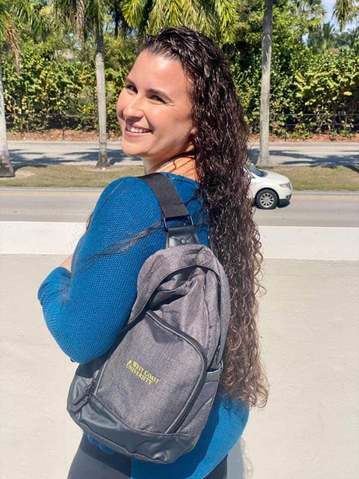 WCU BSN graduate Stephanie Pedre wearing WCU backpack.