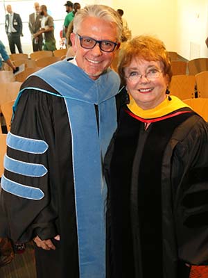 WCU OT Founding Dean, Program Director Nicolaas van den Heever poses with keynote speaker Dr. Mary Evert
