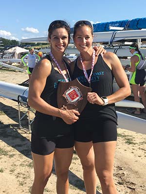 Sara Hendershot and Sarah Zelenka pose with their awards